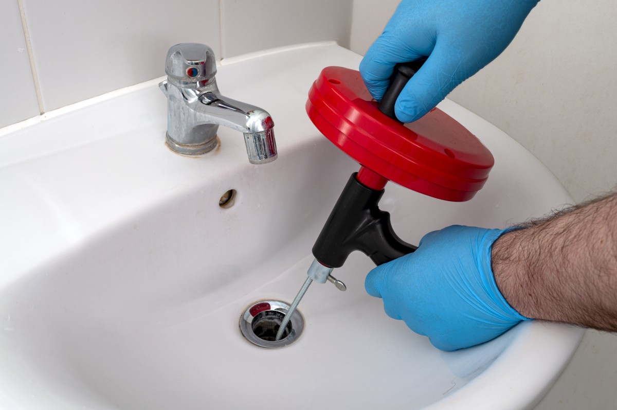 Unclogging Bathroom Sink Drain Auger