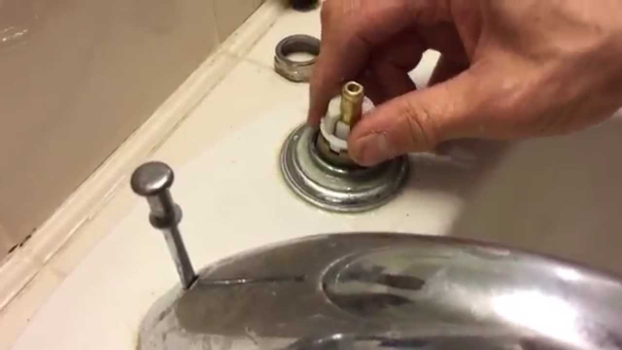 delta bathroom sink handle removal